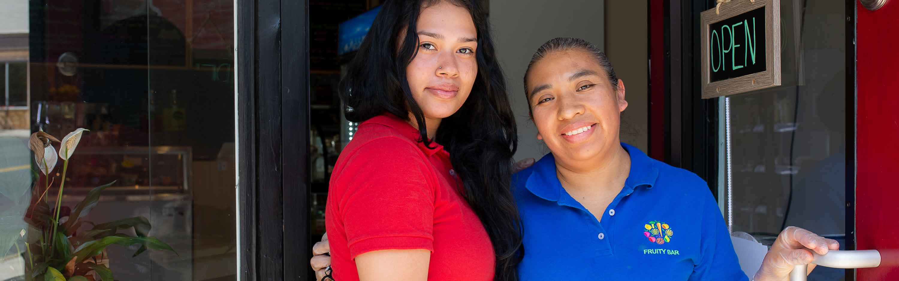 Mother and daughter running local cafe